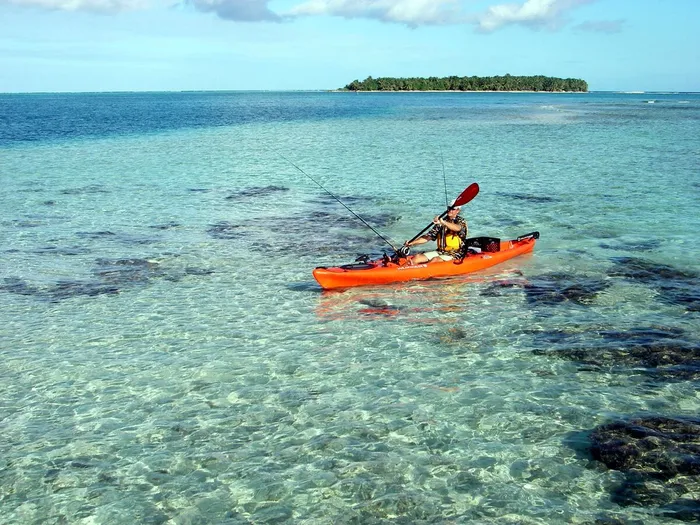 Kayak fishing at Glovers Reef Atoll